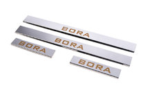 Volkswagen Bora 1998–2004 Nerezové kryty prahů Carmos (4 ks) fotografie 1