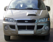 Hyundai H200, H1, Starex 1998–2007 Středový lip předního nárazníku (k lakování) fotografie 1