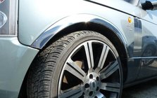 Range Rover III L322 2002–2012 Nerezové lišty na lemy blatníků (4 ks) fotografie 1