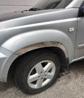 Nissan X-trail T30 2002–2007 Nerezové lišty na lemy blatníků (4 ks) fotografie 1