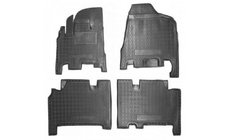 Kia Carnival 2002–2013 Gumové autokoberce s vysokým okrajem АКПП 2006+ 1. a 2. řada (Autogumm) fotografie 1