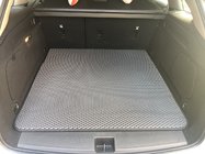 Opel Astra K 2016–2021 EVA koberec do kufru (SW, černý) fotografie 1