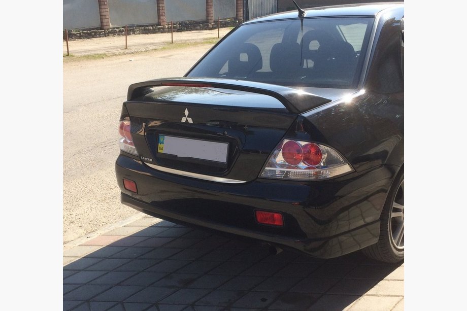 Mitsubishi Lancer 9 2004–2008 Nerezová lišta na hranu víka kufru Image