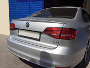 Volkswagen Jetta 2011–2018 Spoiler 2014↗ (k lakování) fotografie 1