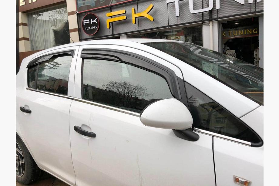 Opel Corsa D 2007–2014 Vnější okenní lišty (4 ks, nerez) OmsaLine – italská nerezová ocel Image
