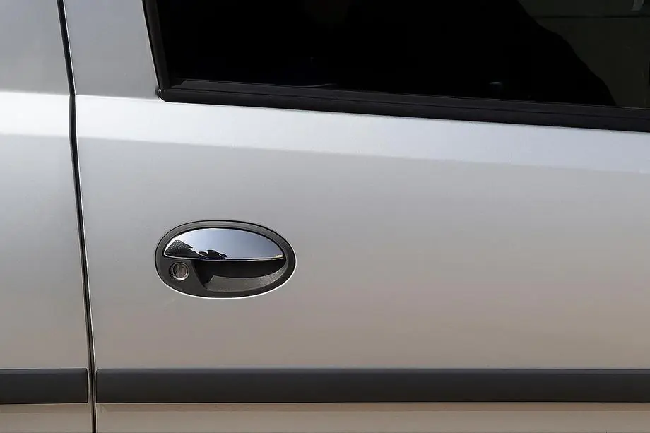 Opel Combo 2002–2012 Nerezové kryty klik (2 ks) Image