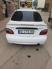 Hyundai Accent 1994–1999 Spoiler Meliset (k lakování) fotografie 2