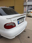 Hyundai Accent 1994–1999 Spoiler Meliset (k lakování) fotografie 1