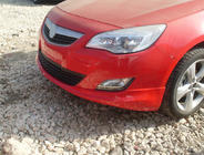 Opel Astra J 2009–2015 Přední spodní nástavec 2010-2012 (k lakování) fotografie 1