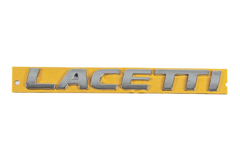 Chevrolet Lacetti 2003–2024 Nápis Lacetti 96416140 (175 × 20 mm) Image
