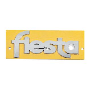 Emblém s nápisem Fiesta YS61B42528AA (117 mm x 52 mm)