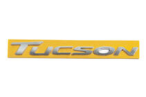 Hyundai Tucson TL 2016–2021 Emblém s nápisem Tucson 86310D300 (220 × 22 mm) fotografie 1