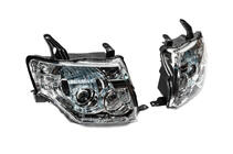 Mitsubishi Pajero Wagon IV 2006–2021 Přední světlomety OEM (2 ks) fotografie 2