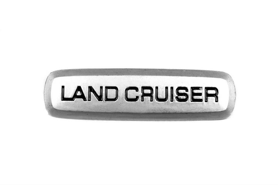 Toyota Land Cruiser hliníkový emblém na autokoberce (1 ks) Fotografie 1
