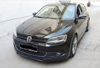 Volkswagen Jetta 2011–2018 Přední lip spoiler DPT (2011-2014, k lakování) fotografie 3