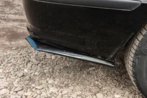 Volkswagen Caddy 2010–2015 Flap nástavce zadního nárazníku DPT (ABS) (2 ks) (lesklá černá) fotografie 3