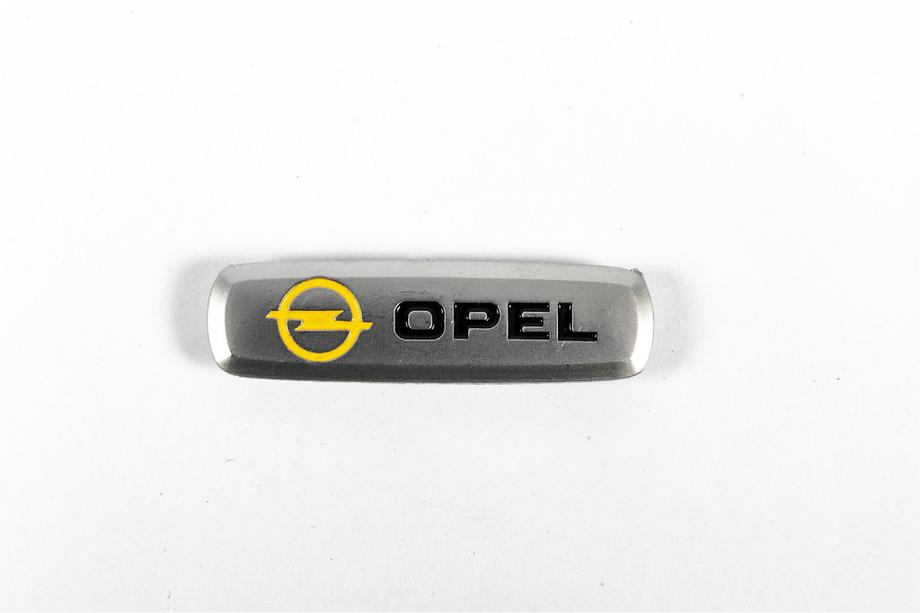 Opel Hliníkový štítek na autokoberce (1 ks) Fotografie 3