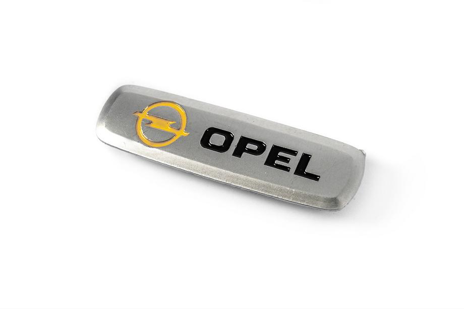 Opel Hliníkový štítek na autokoberce (1 ks) Fotografie 1