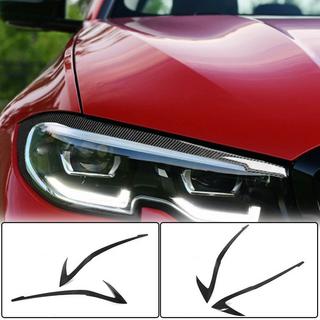 Mračítka na světlomety (2018-2022, karbon) BMW řada 3 G20/G21 2018– fotografie 1