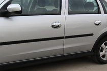 Opel Corsa C 2000–2006 Kryty klik s lemem (8 ks, nerez) fotografie 1