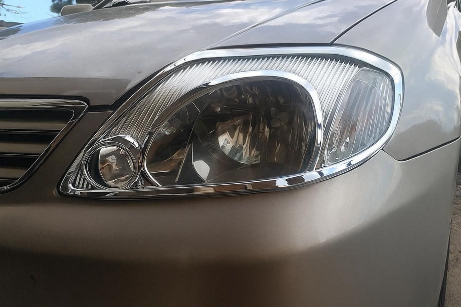 Toyota Corolla 2002–2007 Chromové kryty světlometů V1 (2002-2004, 2 ks, plast) Image