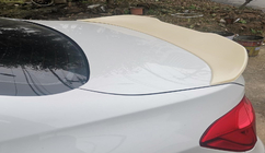 BMW řada 1 E81/E82/E87/E88 2004–2011 Spoiler ve stylu PSM (pro E82, k lakování) fotografie 2