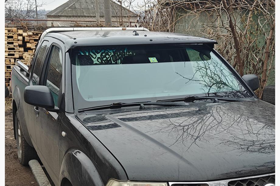 Nissan Navara 2006–2015 Sluneční clona na čelní sklo (na rámu) Image