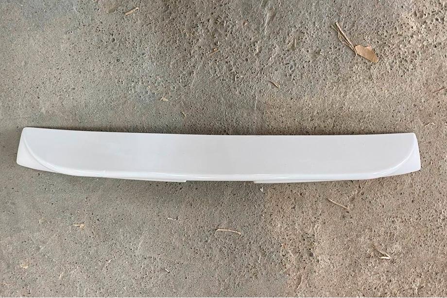 Volkswagen Caddy 2010–2015 Výprodej ABS spoiler (lesklá bílá) Fotografie 2