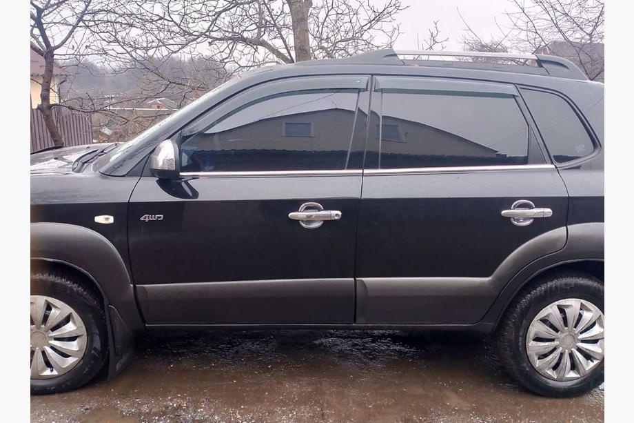 Hyundai Tucson JM 2004– Nerezové rámečky oken (4 ks) Fotografie 1
