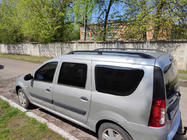 Dacia Logan MCV 2004–2014 Černé střešní ližiny Kovové nožky fotografie 1