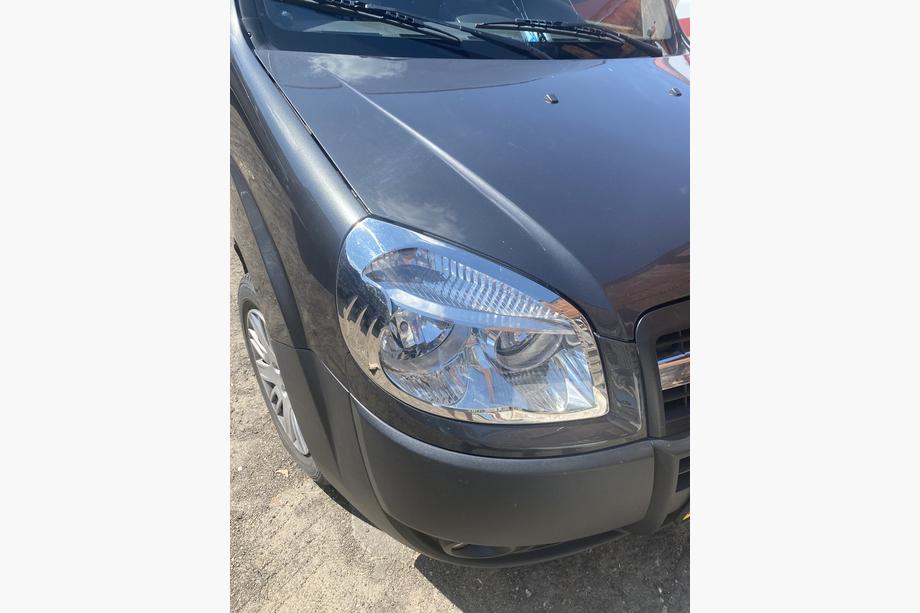 Fiat Doblo I 2005–2010 Rámečky světlometů (2 ks, ocel) Carmos - turecká ocel Fotografie 2