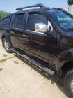 Nissan Navara 2006–2015 Kryty klik (4 ks, nerez) fotografie 4