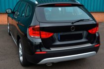 BMW X1 E84 2009–2015 Ochranná lišta na zadní nárazník OmsaLine (nerez) fotografie 2