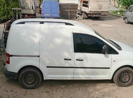 Volkswagen Caddy 2010–2015 Strešní podélníky Skyport BLACK Standardní základna fotografie 6