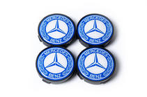 Mercedes-Benz Středové krytky na disky 55,5 mm/57 mm bez kroužku (4 ks, modré) fotografie 2