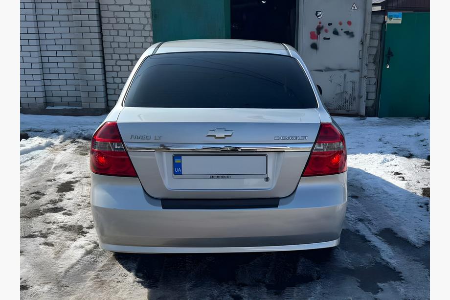 Chevrolet Aveo T250 2005–2011 Plastový nástavec zadního nárazníku s ohybem Matná, sedan – 4dveřový Image
