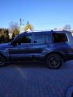 Mitsubishi Pajero Wagon IV 2006–2021 Chromované střešní podélníky – turecký design (2 ks) fotografie 3