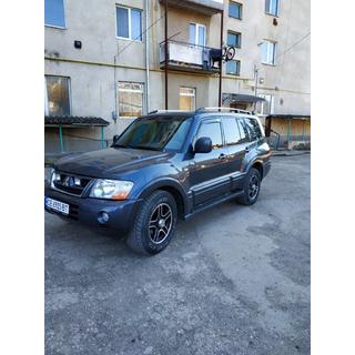 Chromované střešní podélníky – turecký design (2 ks) Mitsubishi Pajero Wagon IV 2006–2021 fotografie 4