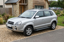 Hyundai Tucson JM 2004– Boční nášlapy New Vision Black (2 ks, hliník) fotografie 1