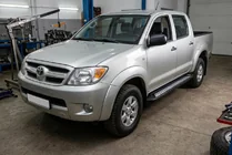 Toyota Hilux 2006–2015 Boční nášlapy New Vision Black (2 ks, hliník) fotografie 1