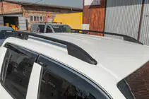 Volkswagen Amarok 2010–2022 Střešní podélníky OmsaLine Sport (2 ks, černé) fotografie 1