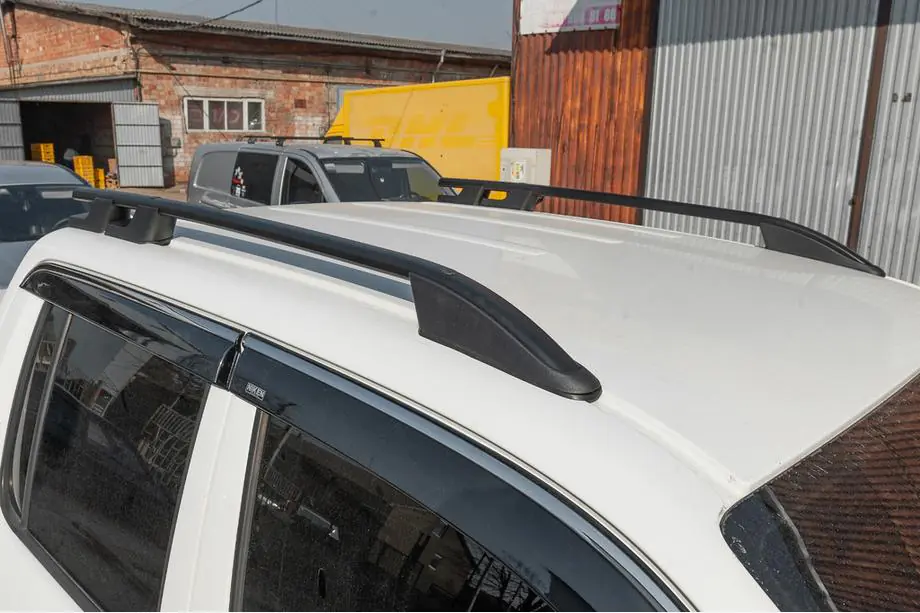 Volkswagen Amarok 2010–2022 Střešní podélníky OmsaLine Sport (2 ks, černé) Image