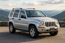 Jeep Cherokee/Liberty 2002–2007 Boční prahy Boshpore Black (2 ks, hliník) fotografie 1