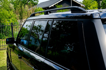 Range Rover III L322 2002–2012 Střešní podélníky Skyport (černé) fotografie 1