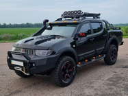 Mitsubishi L200 2015–2024 Boční prahy Dakar V2 s LED (2015-2019, 2 ks, kov) fotografie 10
