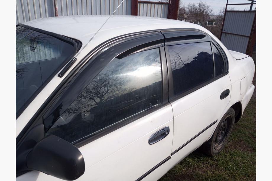 Toyota Corolla 1993–1998 Ofuky oken (4 ks, Sunplex Sport) Image