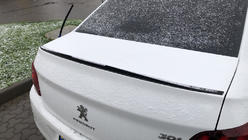 Peugeot 301 2012– Lip spoiler (Sunplex, černý) (118,5 cm × 5,5 cm) fotografie 6