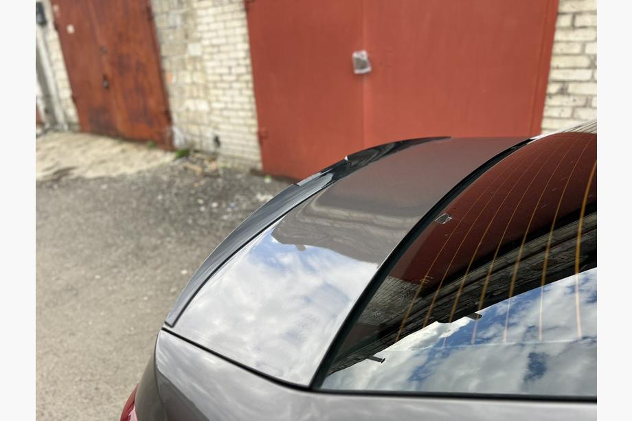 Peugeot 301 2012– Lip spoiler (Sunplex, černý) (118,5 cm × 5,5 cm) Image