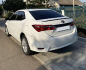 Toyota Corolla 2013–2019 Lip spoiler (Sunplex, černý) (118 cm × 6,4 cm) fotografie 1
