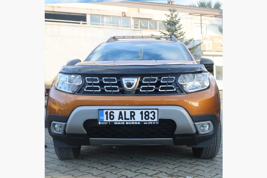 Dacia Duster 2018–2024 Kryty mlhovek (ABS, šedé) Fotografie 4
